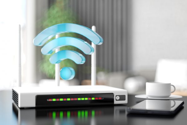 Internet Router with Wifi Sign and Smart Phone in a Modern Living Room Internet Router with Wifi Sign and Smart Phone in a Modern Living Room. 3D Render
